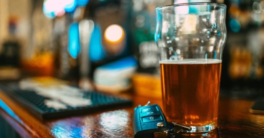 beer and car keys on the table