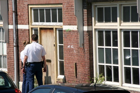 police at door of home